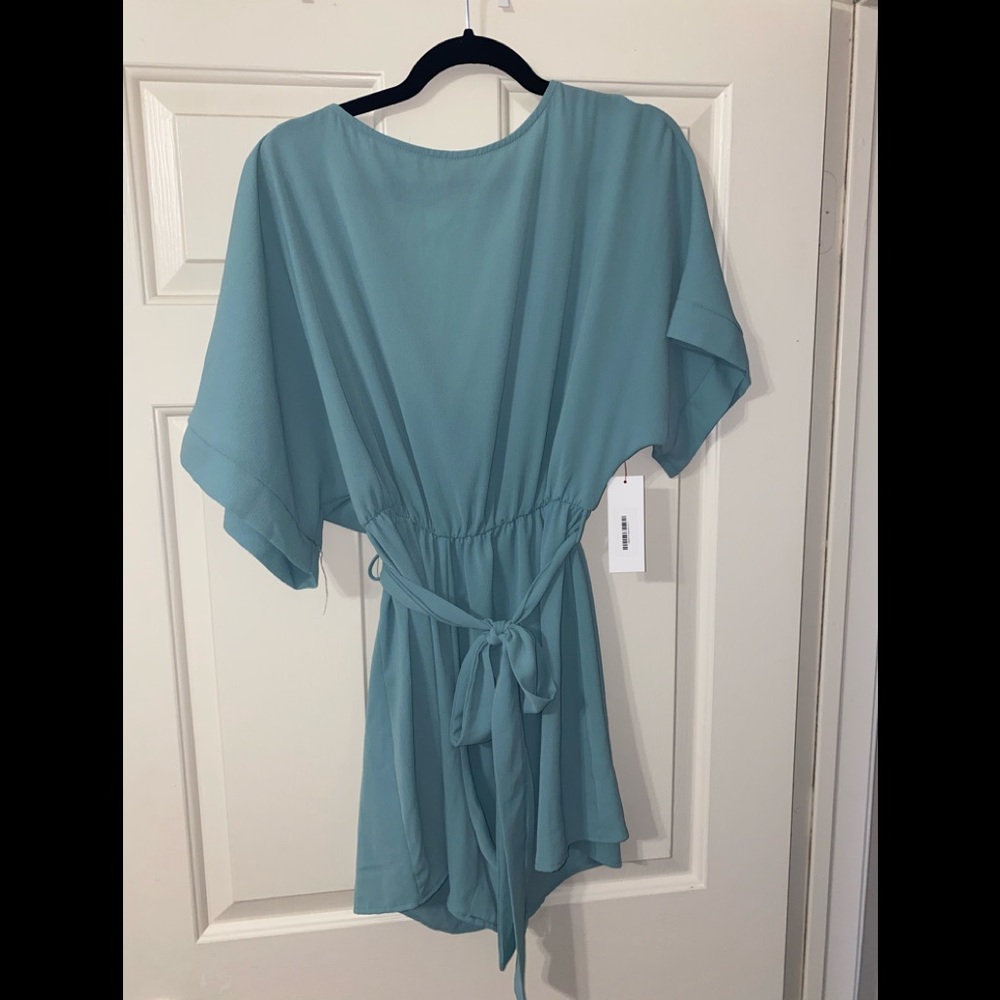 Beautiful blue romper new with tags